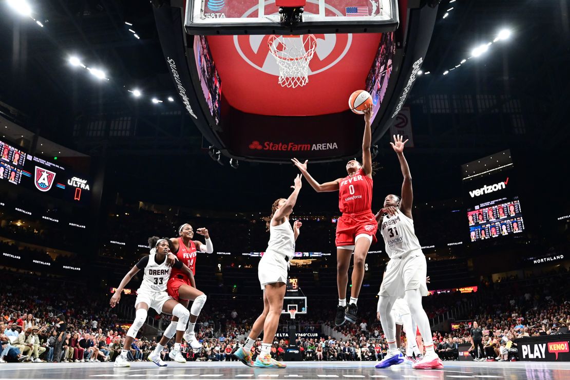 Mitchell drives to the basket during the game.