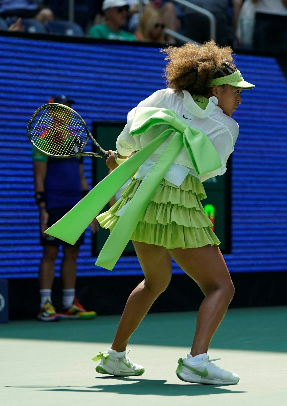 Osaka wore an eye-catching ribbon as part of her warm-up outfit.