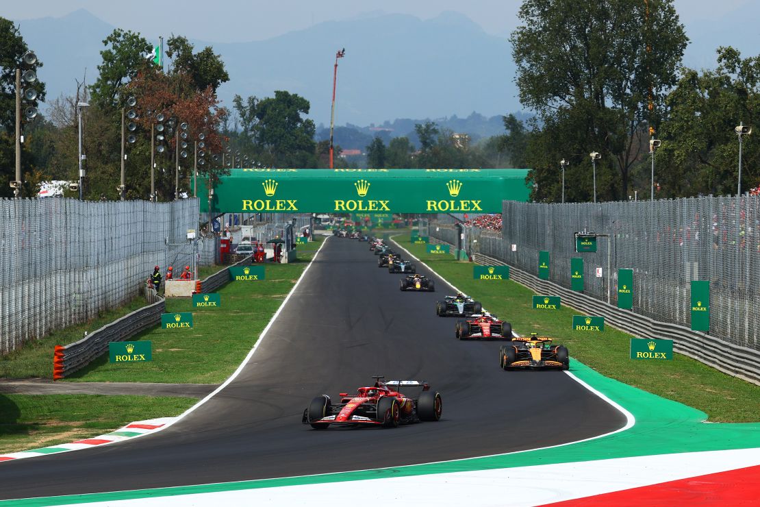 MONZA, ITALY - SEPTEMBER 01: Charles Leclerc of Monaco driving the (16) Ferrari SF-24 leads Lando Norris of Great Britain driving the (4) McLaren MCL38 Mercedes on track during the F1 Grand Prix of Italy at Autodromo Nazionale Monza on September 01, 2024 in Monza, Italy. (Photo by Clive Rose/Getty Images)