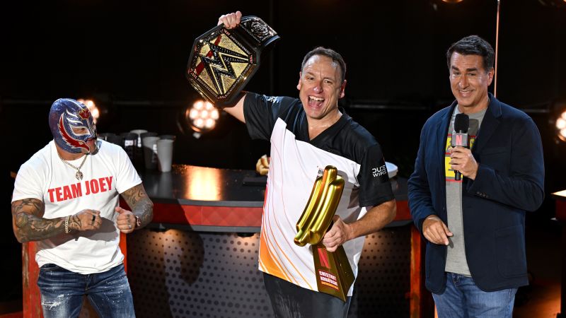 Joey Chestnut breaks own world record, beating rival Takeru Kobayashi in Netflix’s hot dog eating showdown