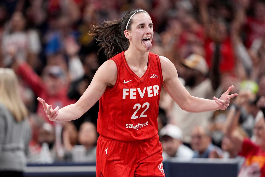 Caitlin Clark of the Indiana Fever celebrates a basket during the second half of a game against the Las Vegas Aces.