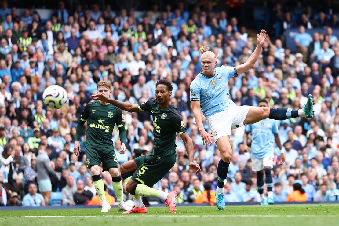 Erling Haaland scores his team's first goal against Brentford.