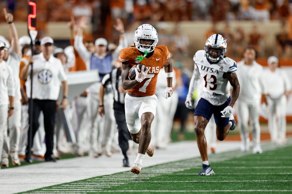 Isaiah Bond of the Texas Longhorns catches a pass and runs for a touchdown in the second half against the UTSA Roadrunners.