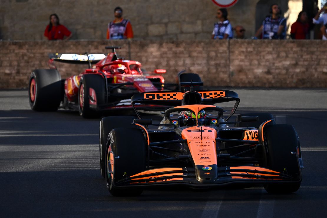 Oscar Piastri (front) fended off Charles Leclerc's challenge.