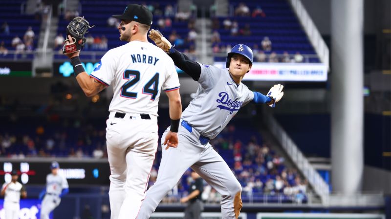 Ohtani celebrates stealing his 50th base of the season.