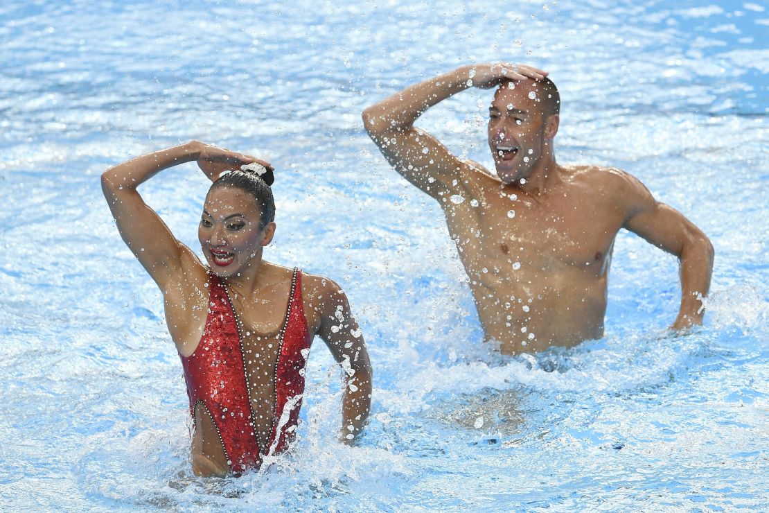 Bill May (right) has previously represented the US at the artistic swimming world championships.