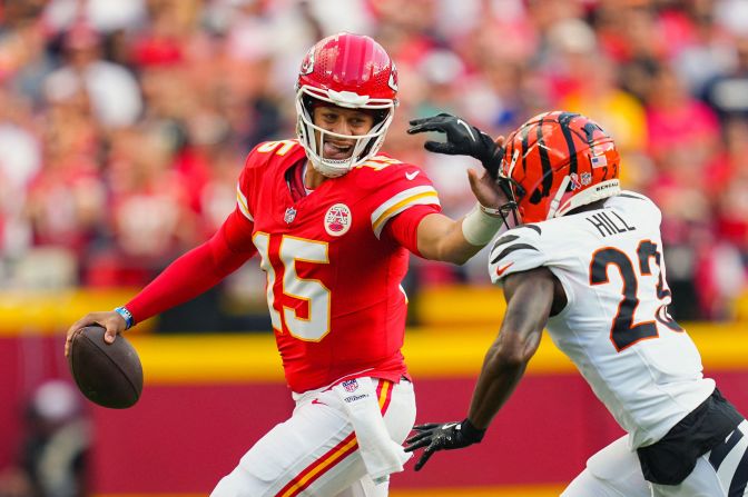 Kansas City Chiefs quarterback Patrick Mahomes runs the ball against Cincinnati Bengals cornerback Dax Hill during the Chiefs' 26-25 victory in Kansas City, Missouri, on Sunday, September 15. The defending Super Bowl champs moved to 2-0 on the season.