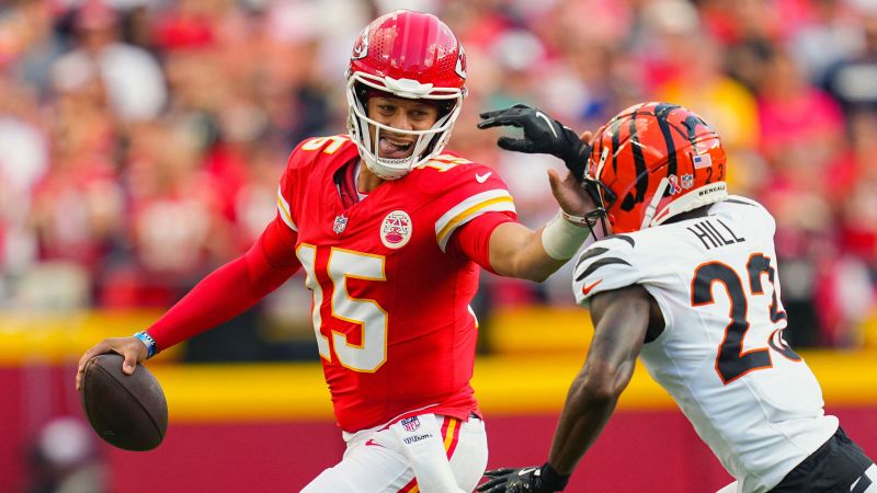 Kansas City Chiefs quarterback Patrick Mahomes runs the ball against Cincinnati Bengals cornerback Dax Hill during the Chiefs' 26-25 victory in Kansas City, Missouri, on Sunday, September 15. The defending Super Bowl champs moved to 2-0 on the season.