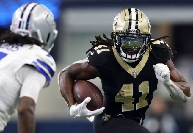 New Orleans Saints running back Alvin Kamara runs the ball during the Saints' 44-19 win over the Dallas Cowboys in Arlington, Texas, on September 15. Kamara had four touchdowns in the game.