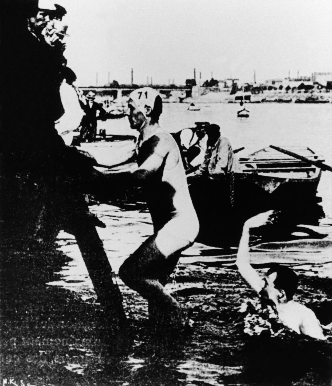 Australian Frederick Lane emerges from the River Seine in Paris after winning Olympic gold in obstacle course swimming in 1900.