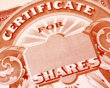 A blank paper stock certificate for shares of a publicly traded company.