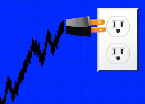 A graph/plug trending upwards toward electrical plug