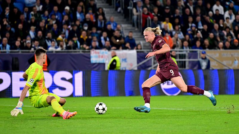 Manchester City equals ‘unbeaten’ record, Borussia Dortmund nets five first-half goals in high-scoring Champions League night | CNN