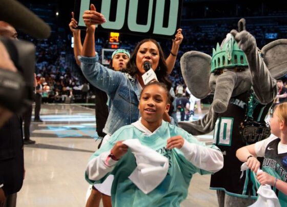 Ellie shows off her style at Game 1 of the WNBA semifinals.