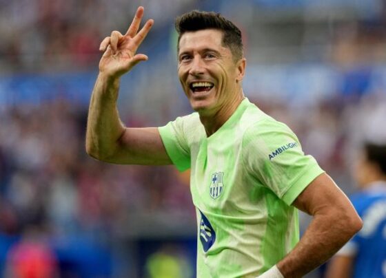 Lewandowski fires home his third goal of the game.