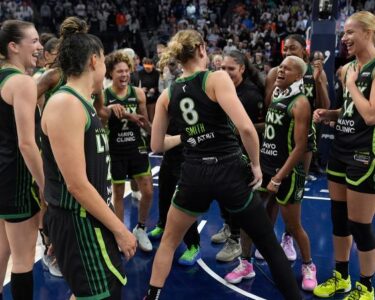 Minnesota Lynx players celebrate after advancing to the WNBA Finals.