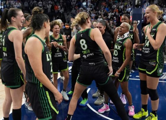 Minnesota Lynx players celebrate after advancing to the WNBA Finals.