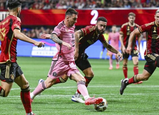 Olivier Giroud hoists the championship trophy after LAFC defeated Sporting Kansas City 3-1 in extra time in the US Open Cup.