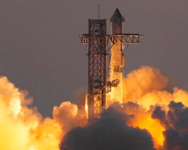 Space SpaceX catches Starship rocket booster in dramatic landing during fifth flight test