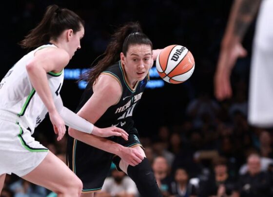 Minnesota Lynx guard Courtney Williams shoots over New York Liberty star Sabrina Ionescu in Game 2 of the WNBA Finals.