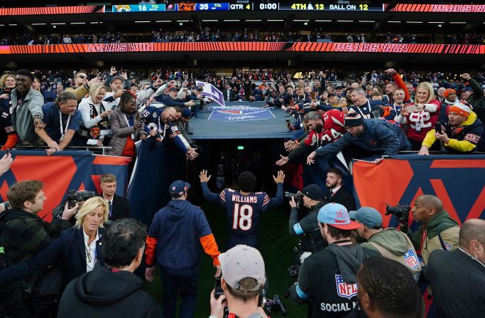 Chicago Bears quarterback Caleb Williams walks down the tunnel after his team beat the Jacksonville Jaguars 35-16 at the Tottenham Hotspur Stadium in London on October 13. Williams completed 23 of his 29 pass attempts and throwing for 226 yards and four touchdowns.