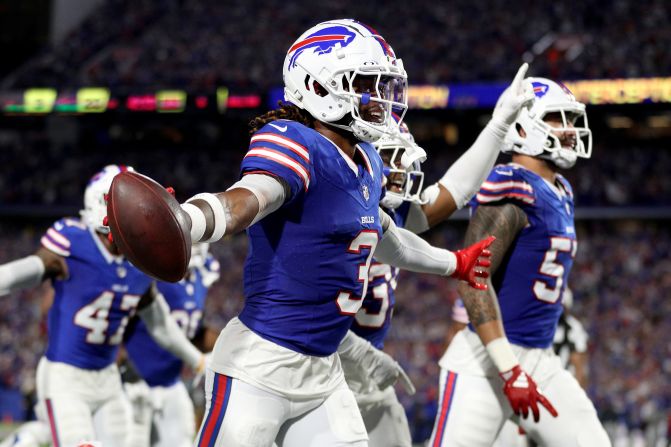 Damar Hamlin of the Buffalo Bills celebrates an interception during the second quarter against the Jacksonville Jaguars in Orchard Park, New York, on Monday, September 23. This was his first career interception and latest milestone since he suffered from a cardiac arrest on the field in early 2023.