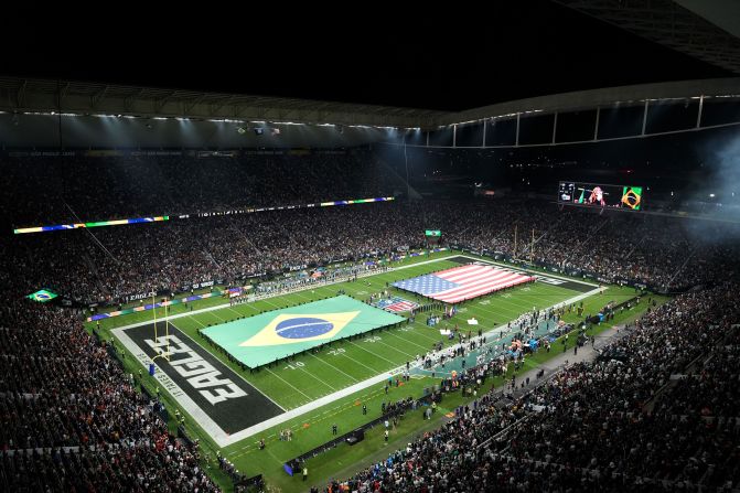 Brazilian and American flags are presented on the field at Neo Química Arena – also known as Corinthians Arena – in São Paulo ahead of the game between the Green Bay Packers and Philadelphia Eagles on Friday, September 6. It was the first NFL game in South America.