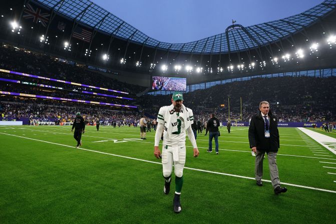 New York Jets quarterback Aaron Rodgers walks off the field after his team's loss to the Minnesota Vikings in London on October 6. Rodgers was intercepted three times.