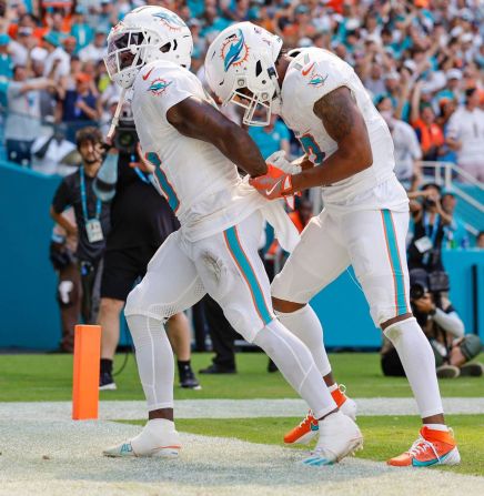 Miami Dolphins wide receivers Tyreek Hill and Jaylen Waddle celebrate a touchdown during a 20-17 victory over the Jacksonville Jaguars in Miami Gardens, Florida, on September 8. Hill was detained for a short time by police after a traffic incident earlier in the day. Miami-Dade Police Department Director Stephanie V. Daniels said Sunday that an investigation has begun into the incident and one of the officers involved is being placed on administrative duties.