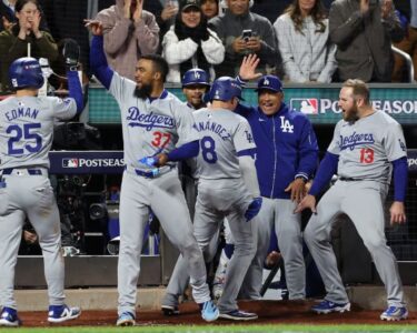 Shohei Ohtani hits a three-run home run in the eighth inning to give the Los Angeles Dodgers a 7-0 lead.