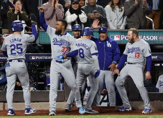 Shohei Ohtani hits a three-run home run in the eighth inning to give the Los Angeles Dodgers a 7-0 lead.