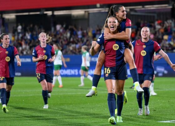 Clàudia Pina scores Barcelona's fifth goal past Anna Tamminen.