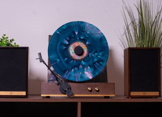 I doubt this retro-style vertical turntable and speakers combo is a good idea, but doesn't it look incredible?