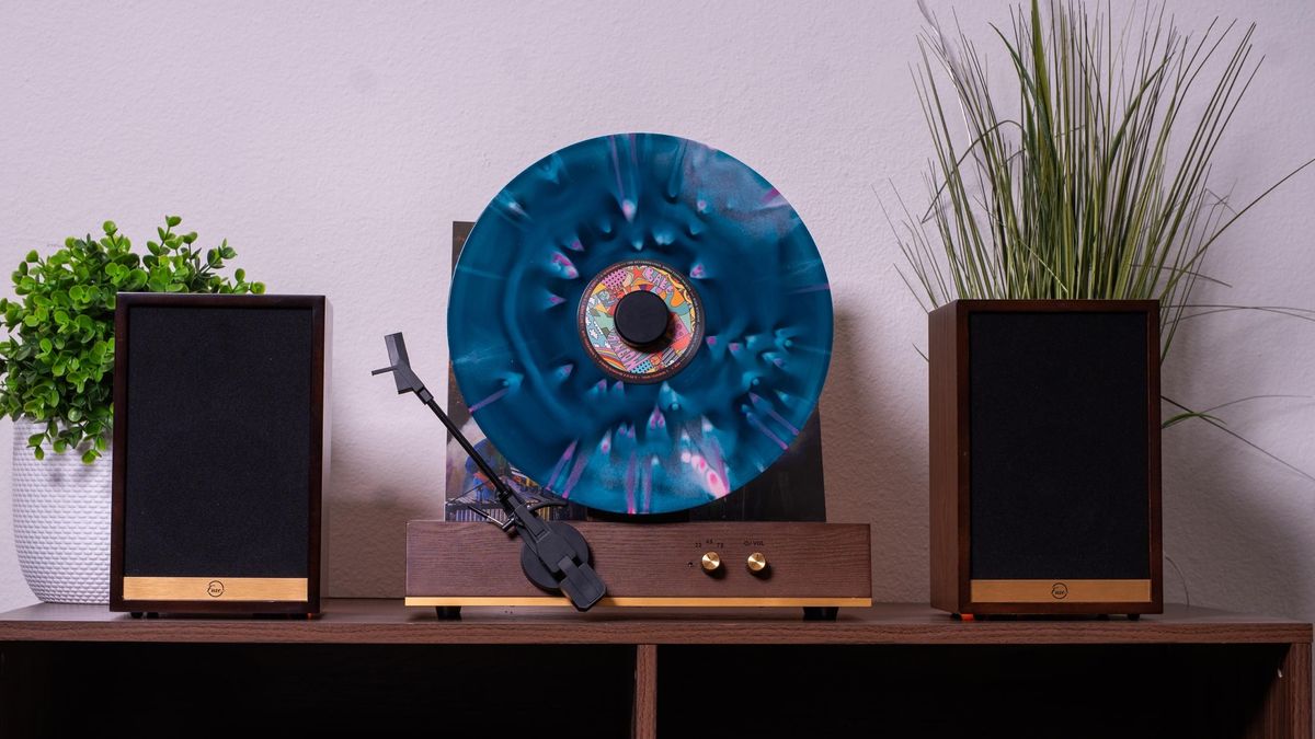 I doubt this retro-style vertical turntable and speakers combo is a good idea, but doesn’t it look incredible?