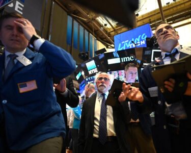 NYSE Traders working during the opening bell.