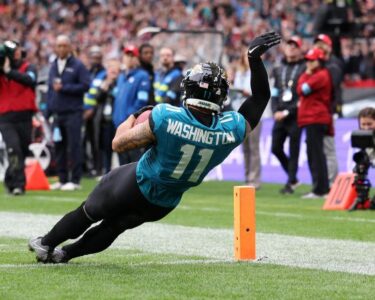 Jacksonville Jaguars wide receiver Brian Thomas Jr. catches a 6-yard pass for a touchdown.