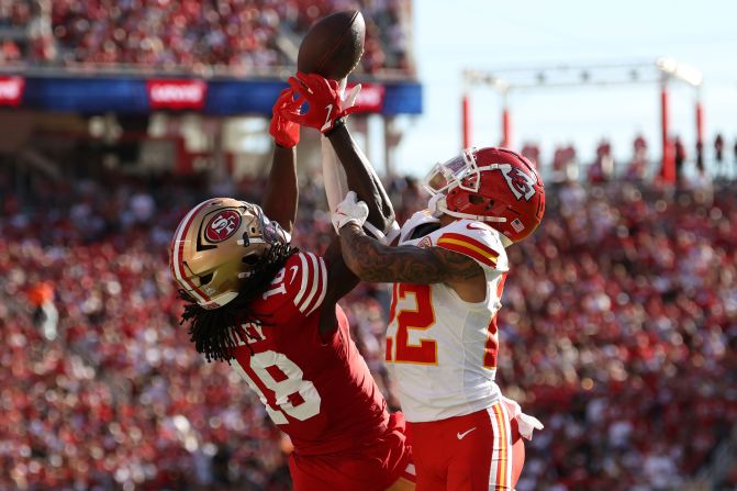 San Francisco 49ers wide receiver Chris Conley and Kansas City Chiefs cornerback Trent McDuffie vie for the ball on October 20 in Santa Clara, California.