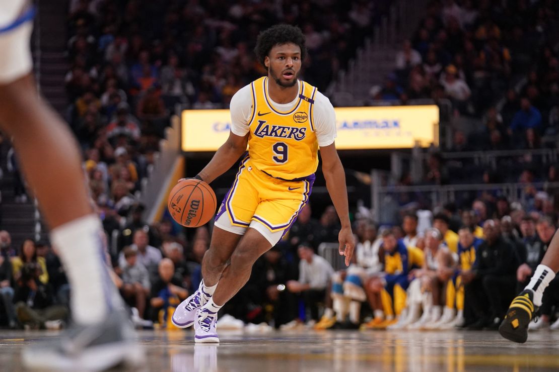 Oct 18, 2024; San Francisco, California, USA; Los Angeles Lakers guard Bronny James (9) dribbles the ball against the Golden State Warriors in the second quarter at the Chase Center. Mandatory Credit: Cary Edmondson-Imagn Images