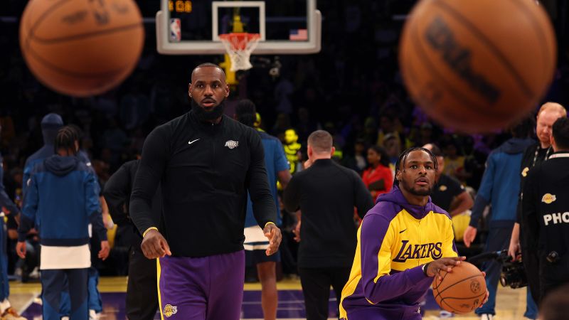 LeBron and Bronny James make history as first father-son to play together in NBA game | CNN