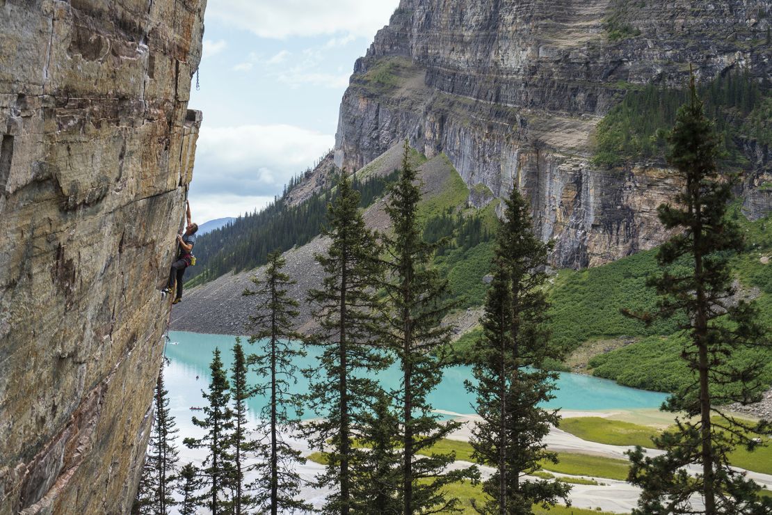 Tommy Caldwell climbing above Lake Louise in Banff National Park in Canada.