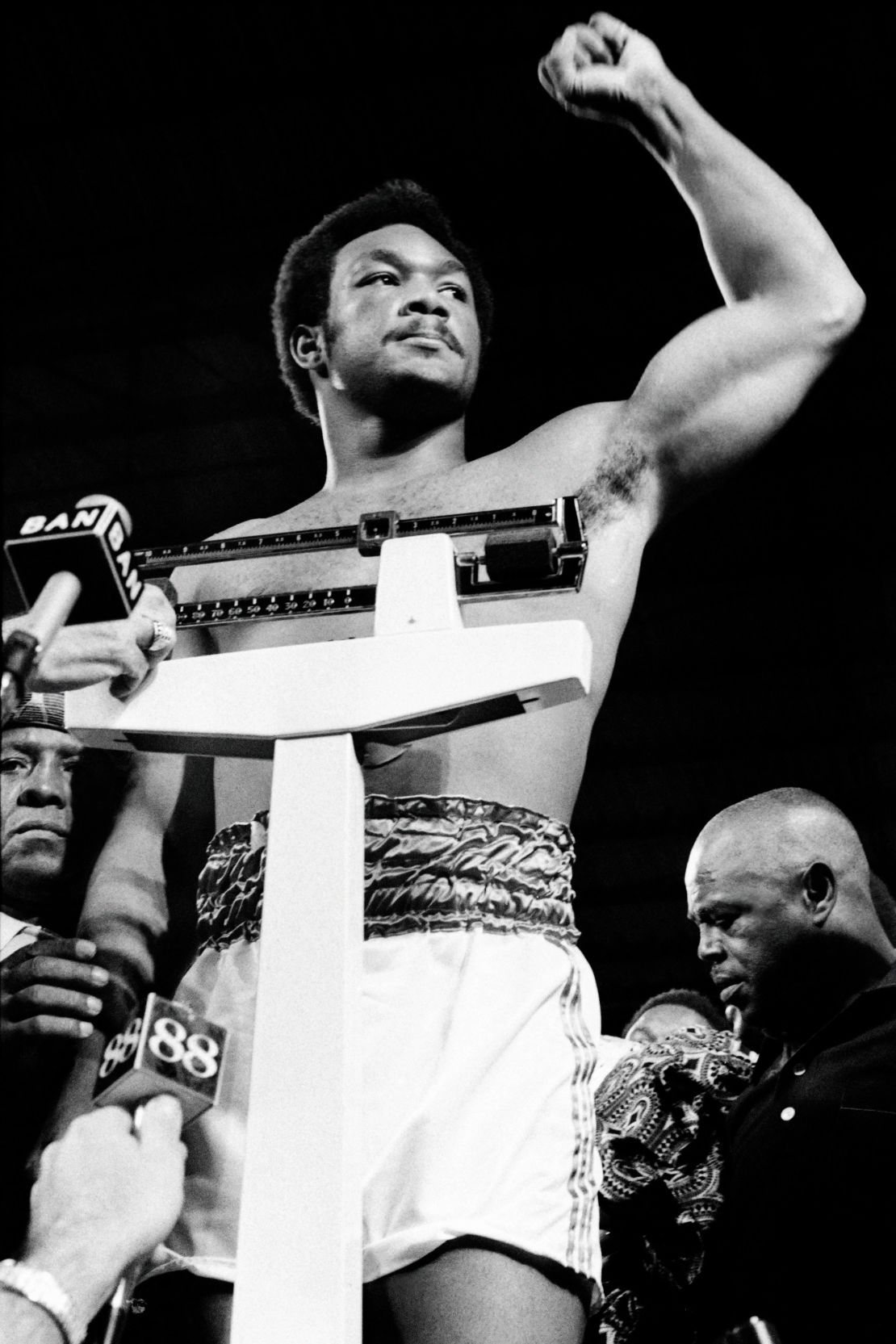 Foreman getures during the weigh-in on October 29, 1974.