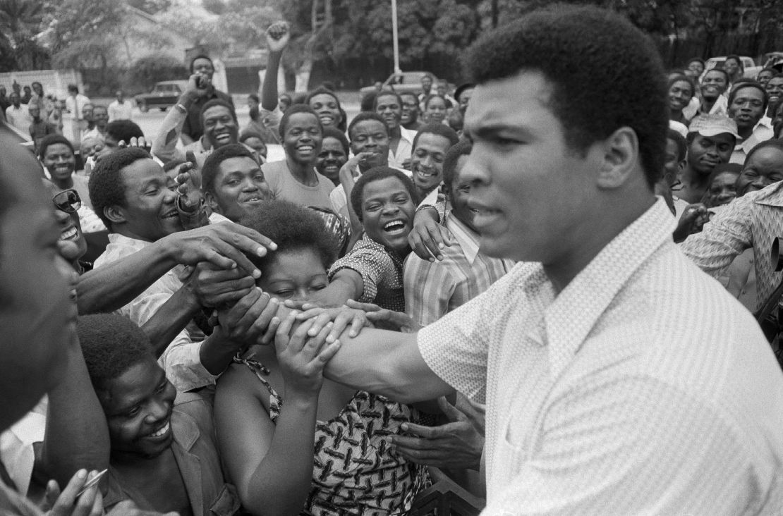 Ali is greeted by locals in Kinshasa on September 17, 1974.