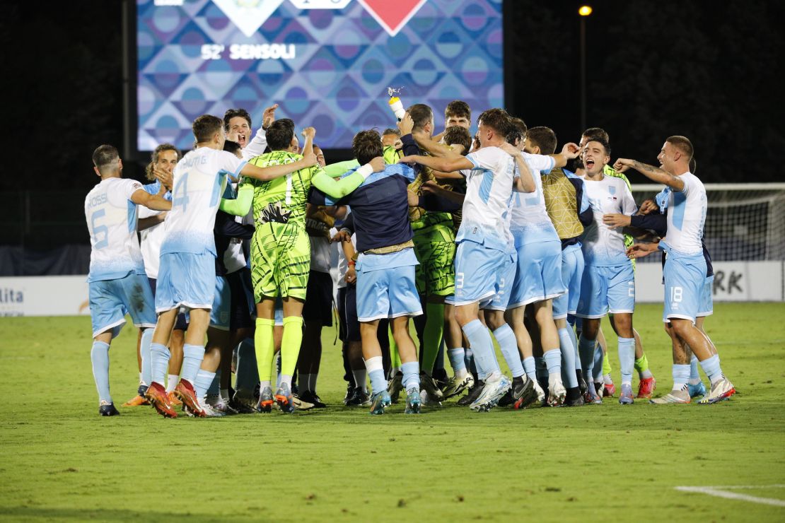 San Marino players celebrate the win over Liechtenstein, the first competitive victory in the team's history.