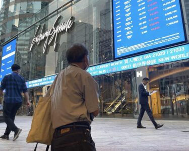 Asian shares are mostly higher after strong earnings boost stocks on Wall St