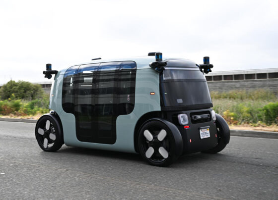 FILE - Phoenix Mayor Kate Gallego arrives in a Waymo self-driving vehicle on Dec. 16, 2022, at the Sky Harbor International Airport Sky Train facility in Phoenix. Self-driving car pioneer Waymo announced Thursday, May 4, 2023, that its robotaxis will be able to carry passengers through most of the Phoenix area for the first time. (AP Photo/Matt York, File)