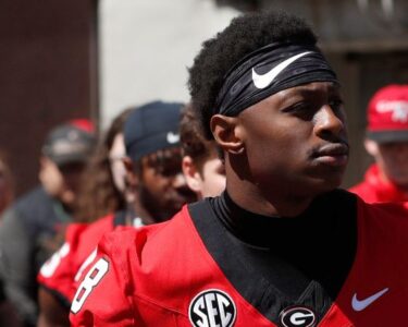 Georgia football player Colbie Young arrested and charged with assault on unborn child and battery | CNN