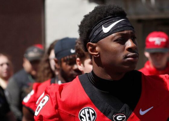 Georgia football player Colbie Young arrested and charged with assault on unborn child and battery | CNN