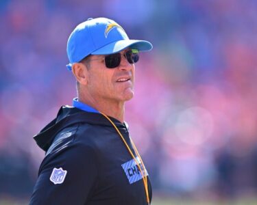 LA Chargers head coach Jim Harbaugh to wear heart monitor for two weeks after leaving Sunday’s game with ‘atrial flutter’ | CNN