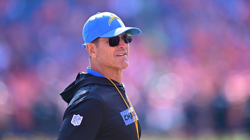 LA Chargers head coach Jim Harbaugh to wear heart monitor for two weeks after leaving Sunday’s game with ‘atrial flutter’ | CNN