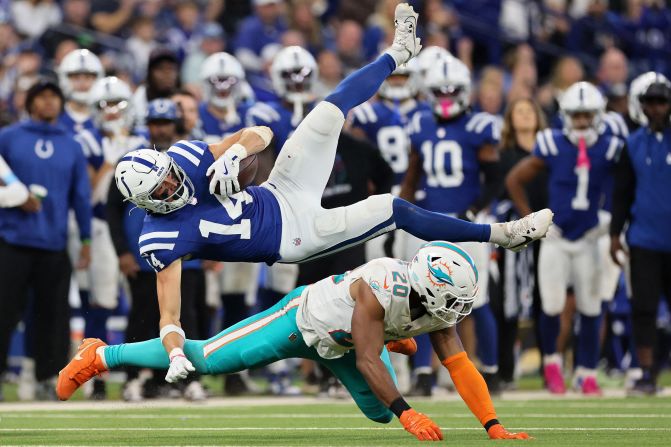 Indianapolis Colts wide receiver Alec Pierce is tackled by Miami Dolphins linebacker Jordyn Brooks on October 20 in Indianapolis. The Colts won 16-10.